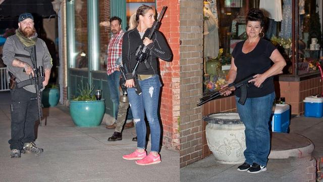 美国白人武装手持AR-15突击步枪,警告“起义军”:乱动就开枪了